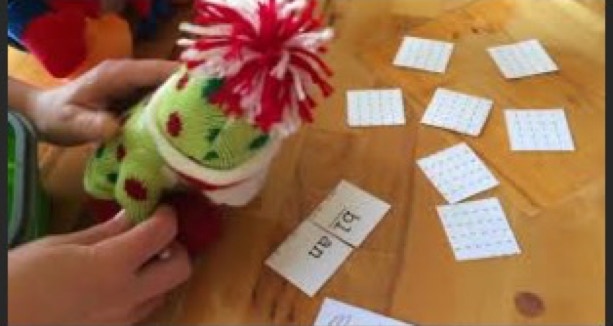 Penguin plays phonics concentration game